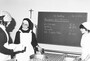 1 geistliche Schwester mit 2 Schülerinnen. 
